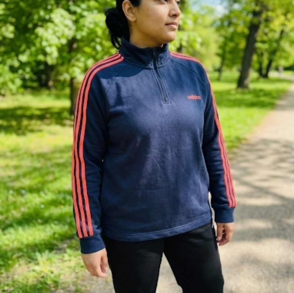 Adidas Women's Navy Blue Zip-Up Sweater with Vibrant Orange Accents